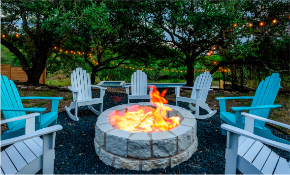 firepit outside with chairs surrounding